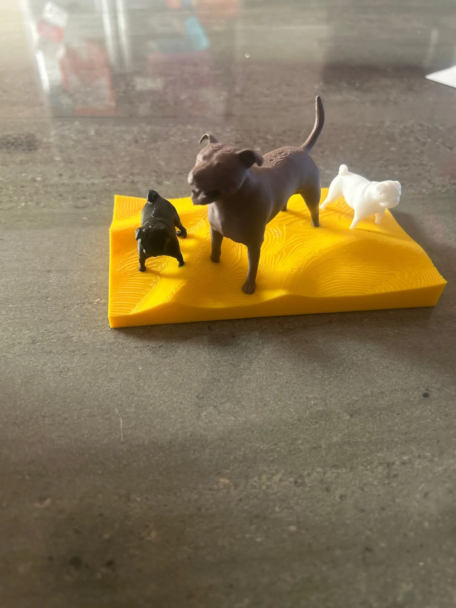 3D printed dog figurines.