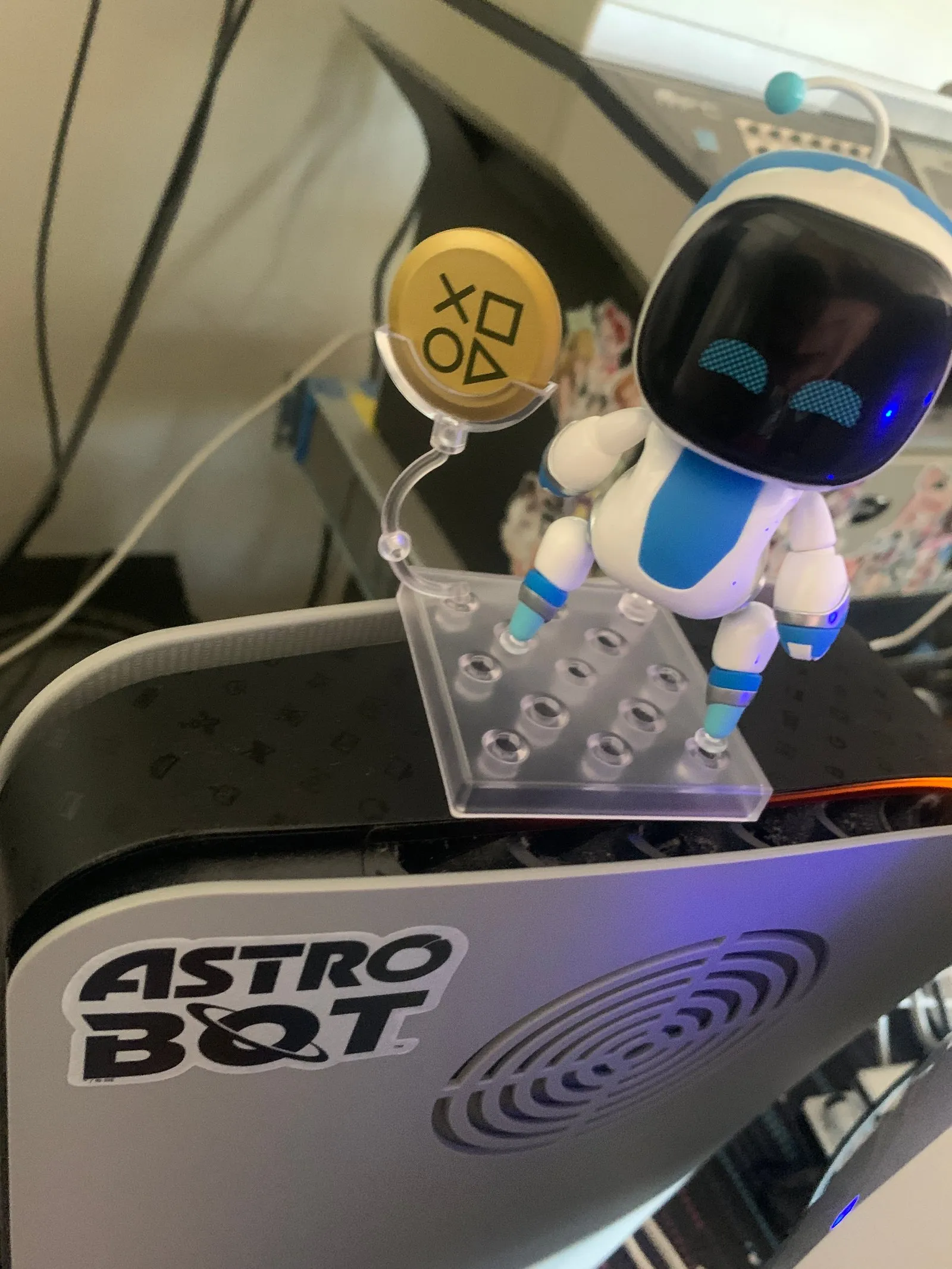 Astro Bot figure on top of my PS5.