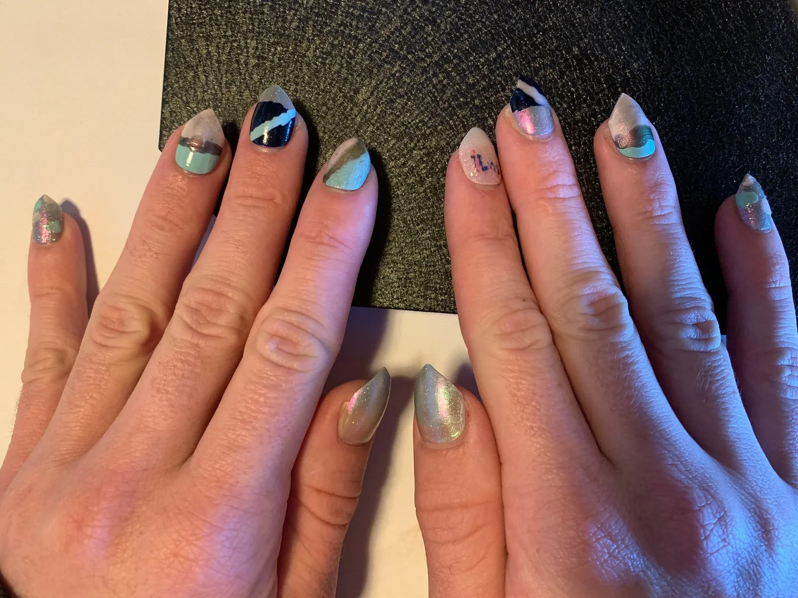 My decorated nails, usually just opting for press-ons, which makes them easier to decorate.