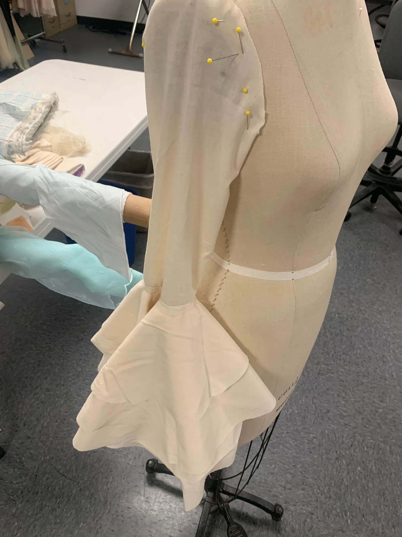 A pagoda sleeve, which is a type of flounce sleeve.