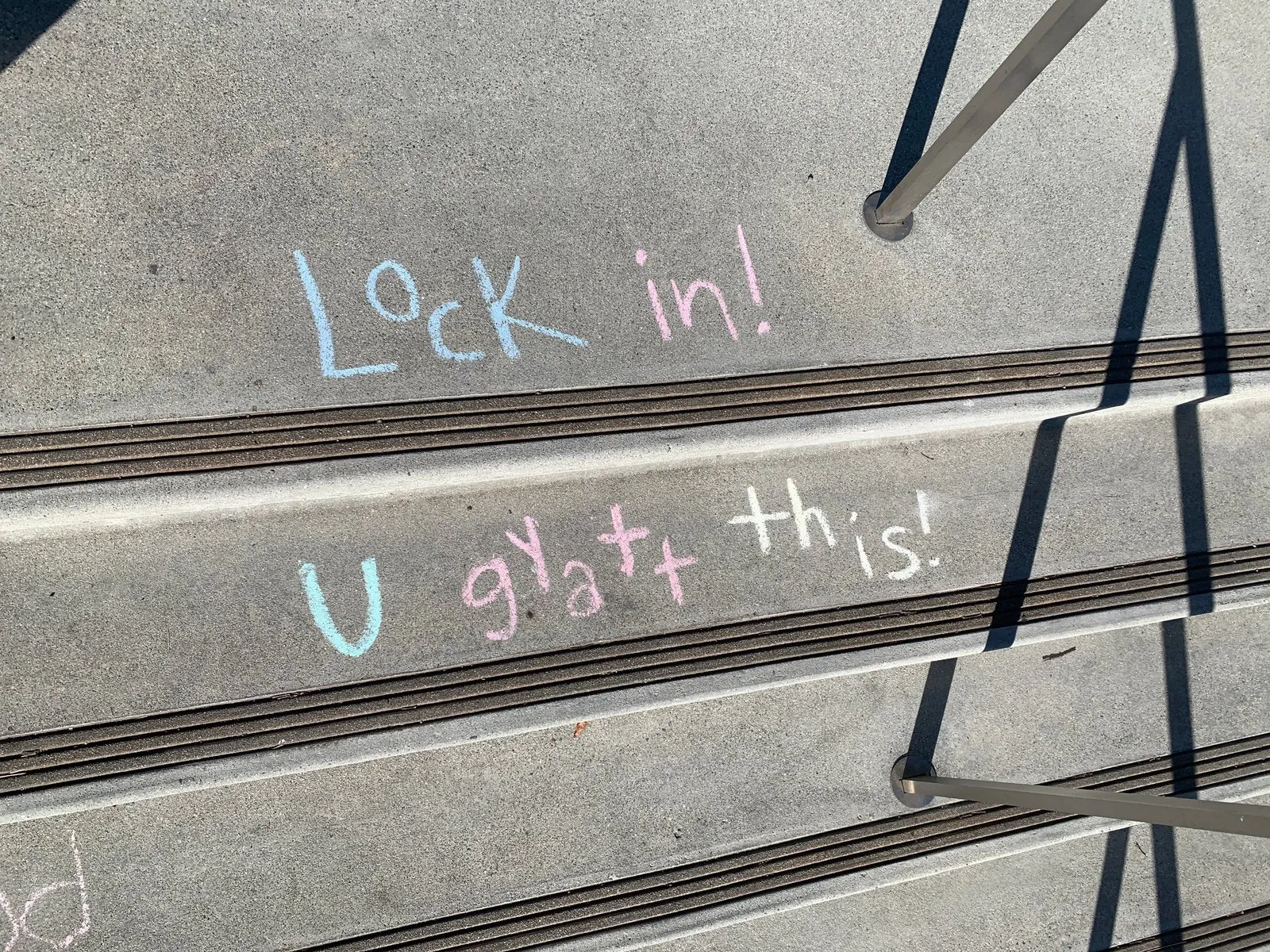 Sidewalk art encouraging students: "Lock in! U gyatt this!"
