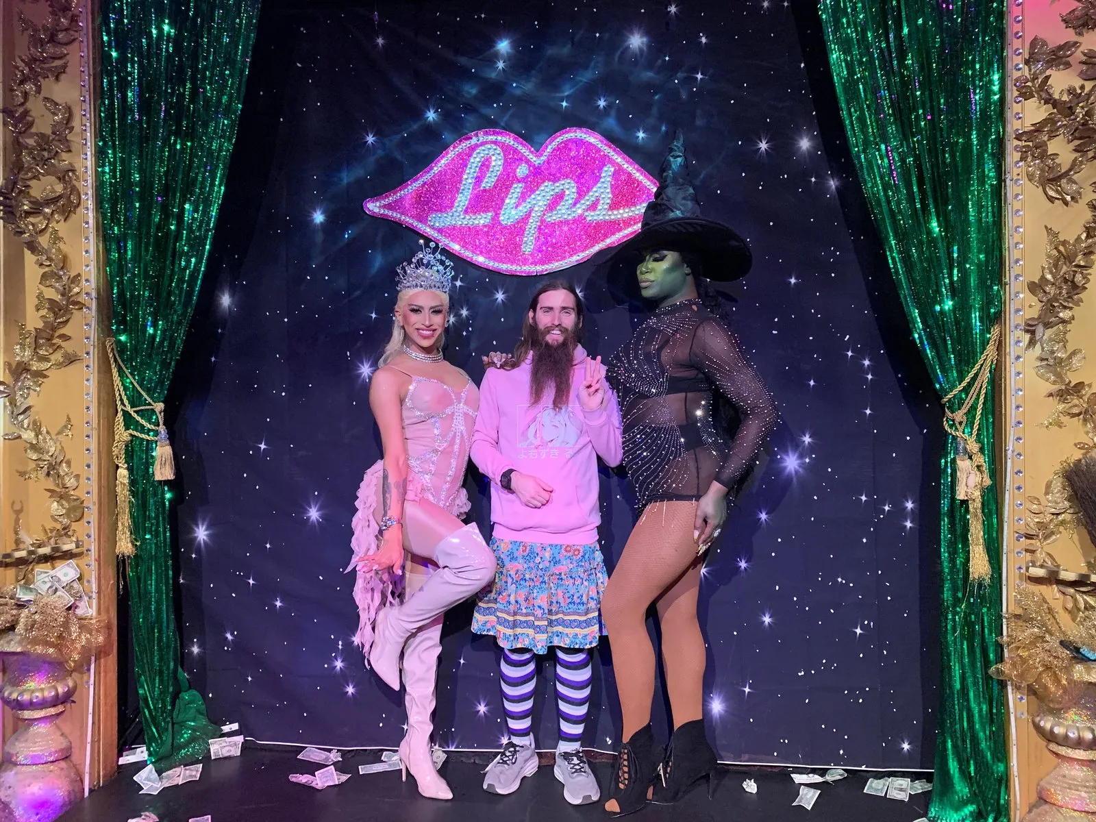 Celebrating at Lips, a drag queen diner, themed Wicked