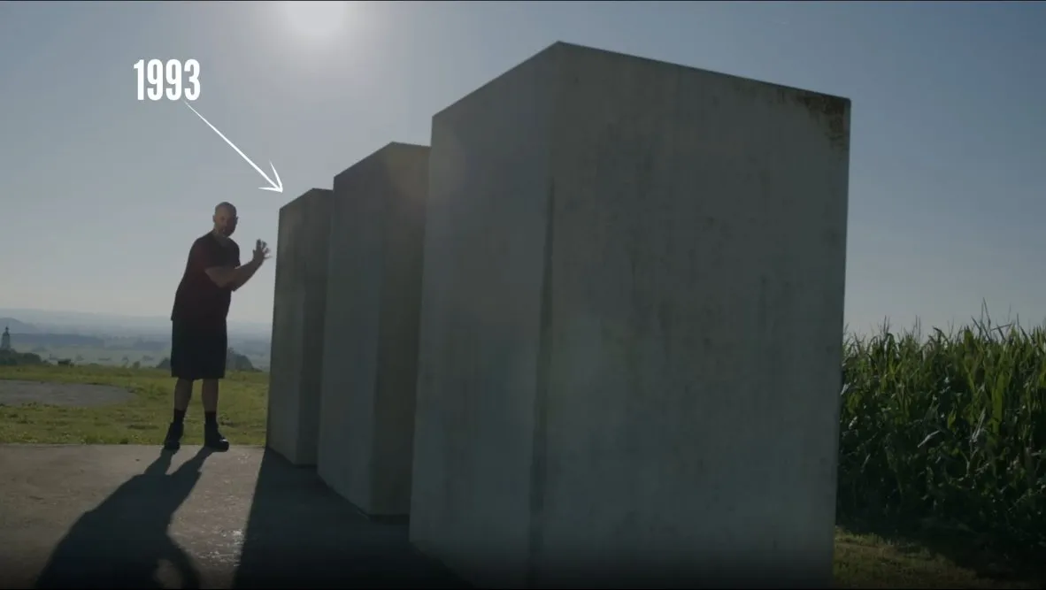 Matt Parker for scale, next to the Time Pyramid concrete blocks, starting with the first placed in 1993.
