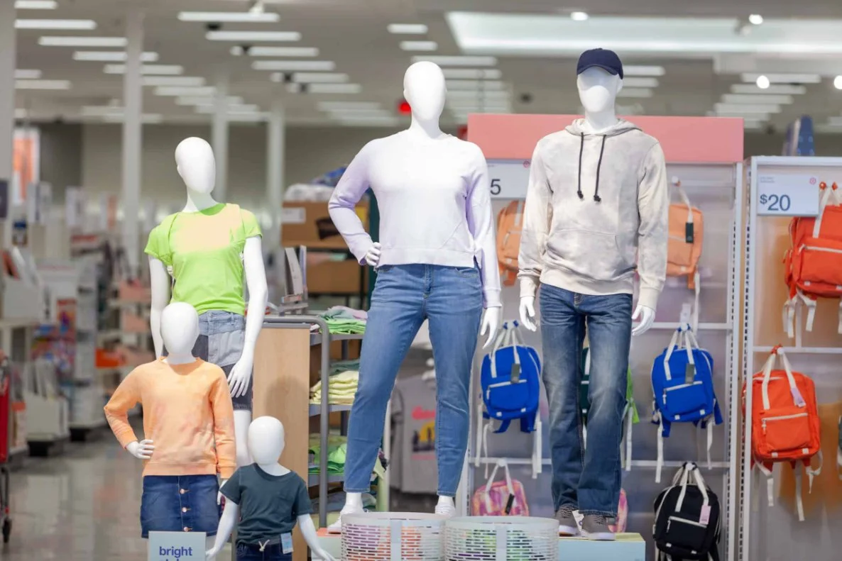 Retail mannequins on display at target, showcasing a range of casual wear.