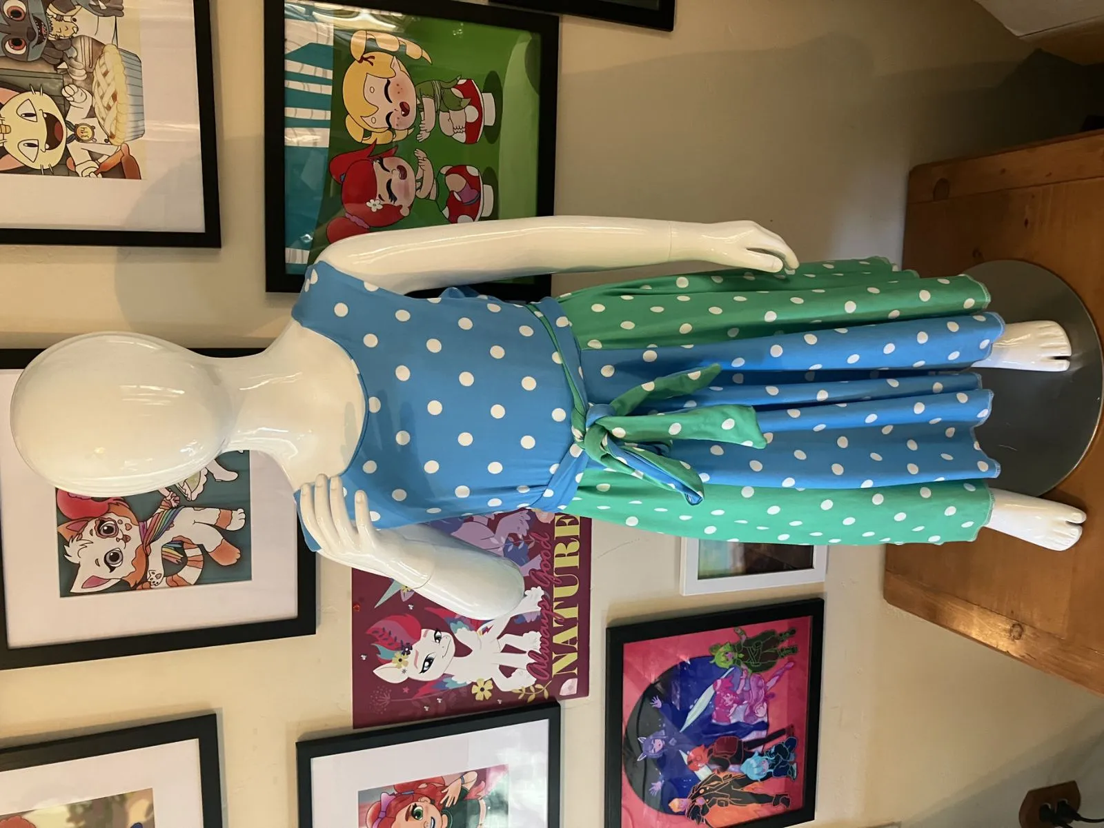 My smaller mannequin, Quinn, featuring a dress made from a commercial pattern.